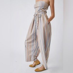 Free People Pastel Striped roaming shores flare leg strip tie romper Jumpsuit